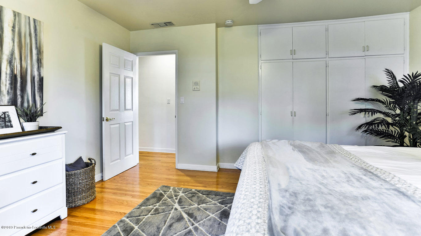 3810 Fairmeade Road Pasadena, CA 91107 - Photo 21 of 47 a bedroom with a bed and a view of bedroom
