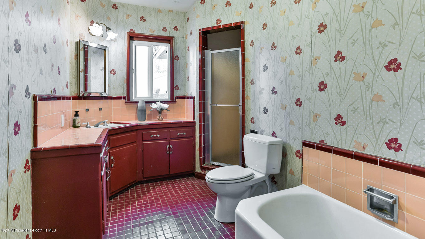 3810 Fairmeade Road Pasadena, CA 91107 - Photo 22 of 47 a bathroom with a sink a toilet and shower