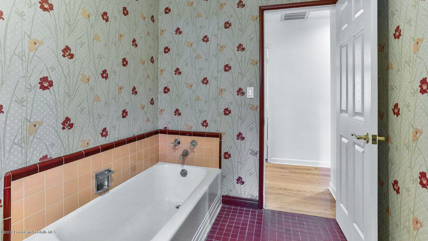3810 Fairmeade Road Pasadena, CA 91107 - Photo 23 of 47 a bathroom with a bathtub and a shower