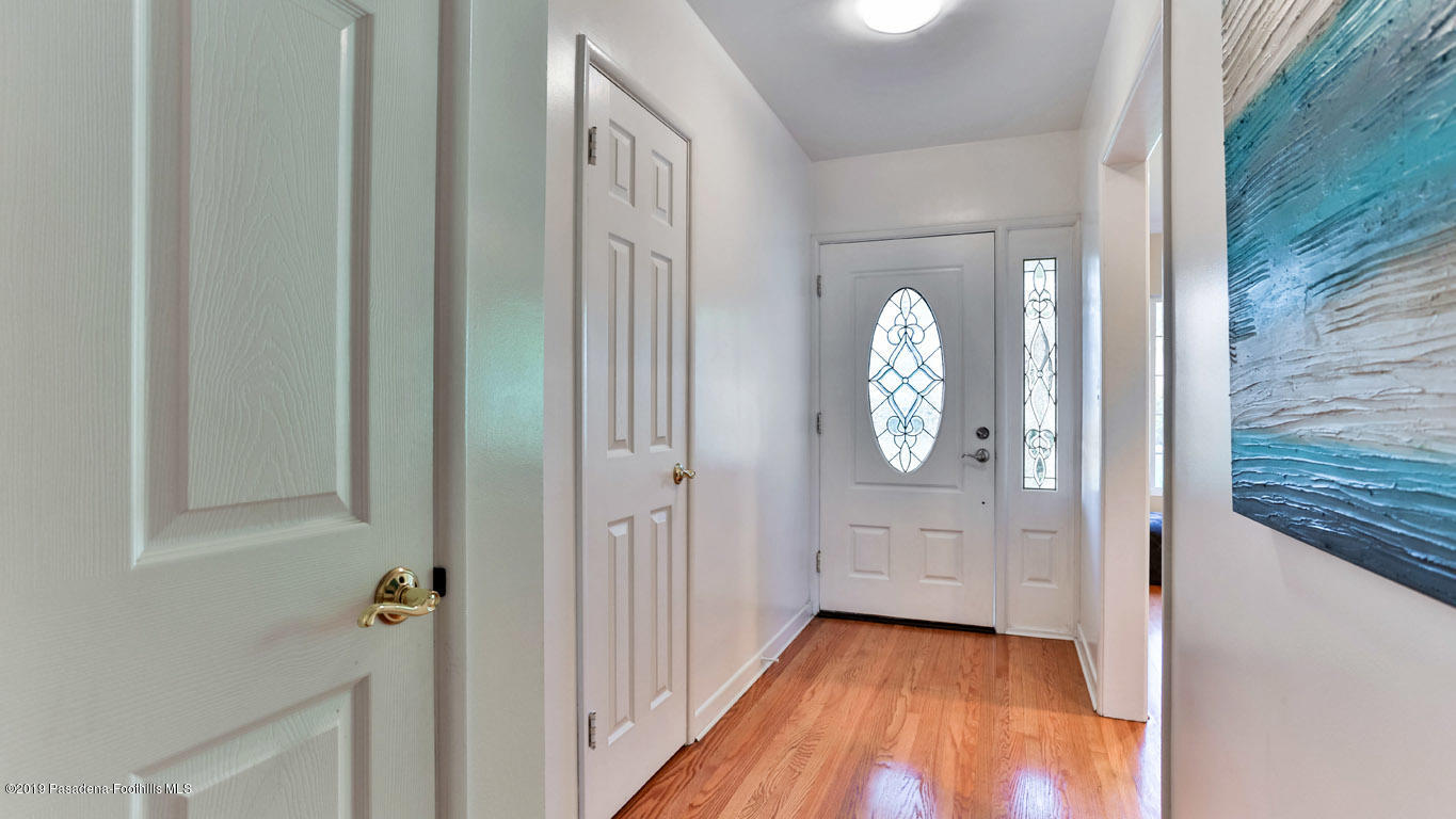 3810 Fairmeade Road Pasadena, CA 91107 - Photo 4 of 47 a view of an entryway with wooden floor