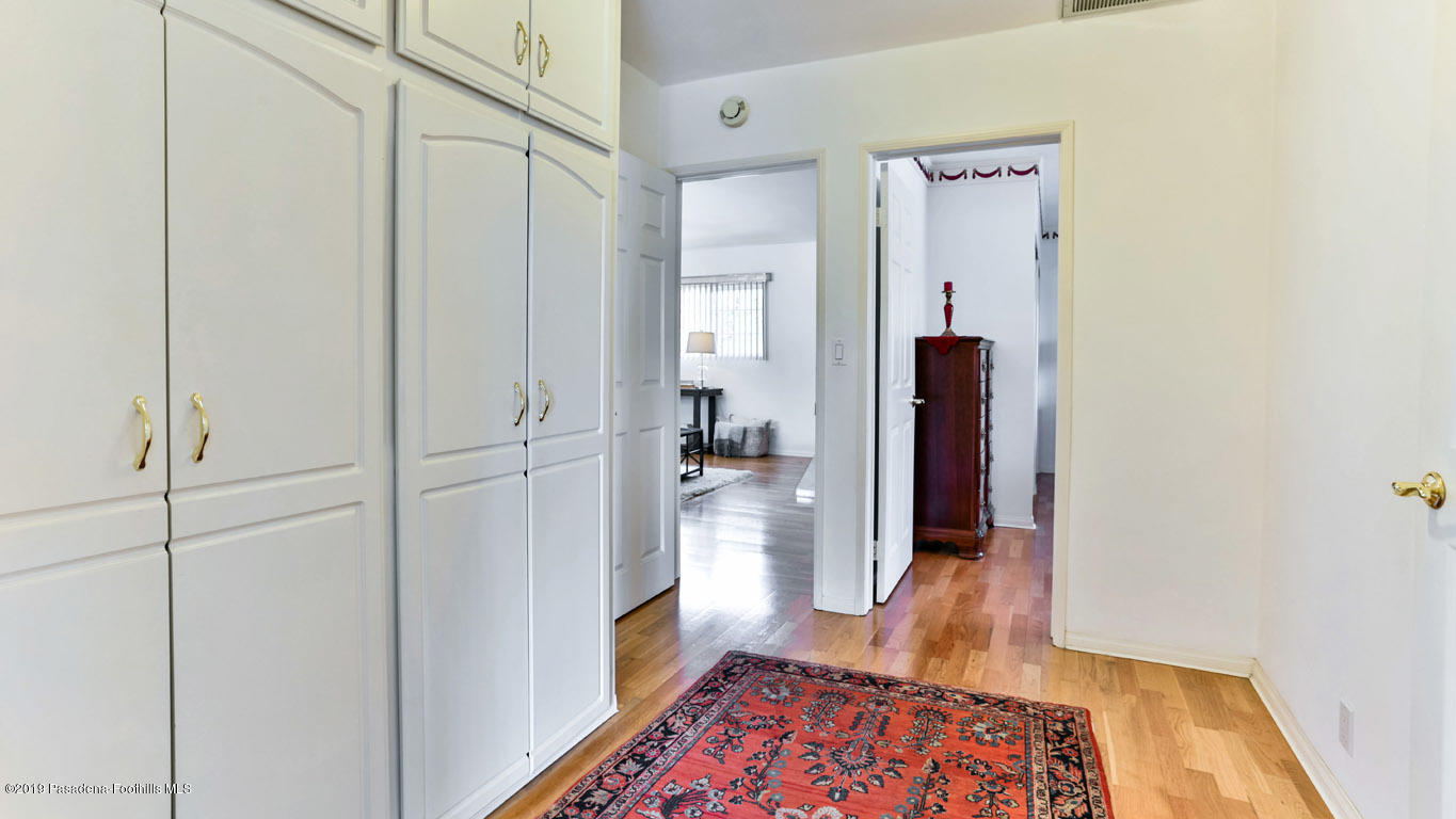 3810 Fairmeade Road Pasadena, CA 91107 - Photo 35 of 47 a view of hallway with wooden floor