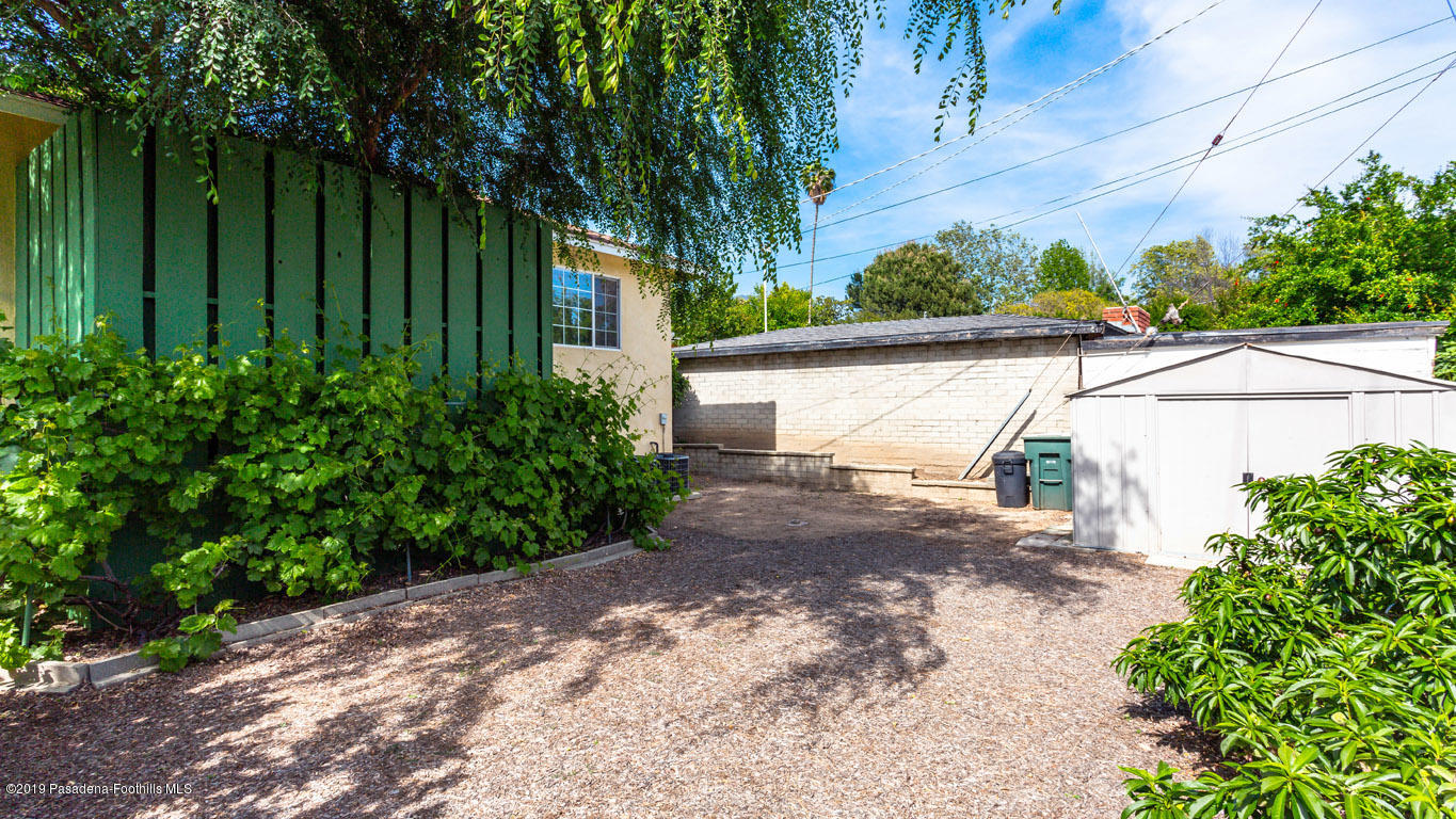 3810 Fairmeade Road Pasadena, CA 91107 - Photo 43 of 47 a view of a street with a trees