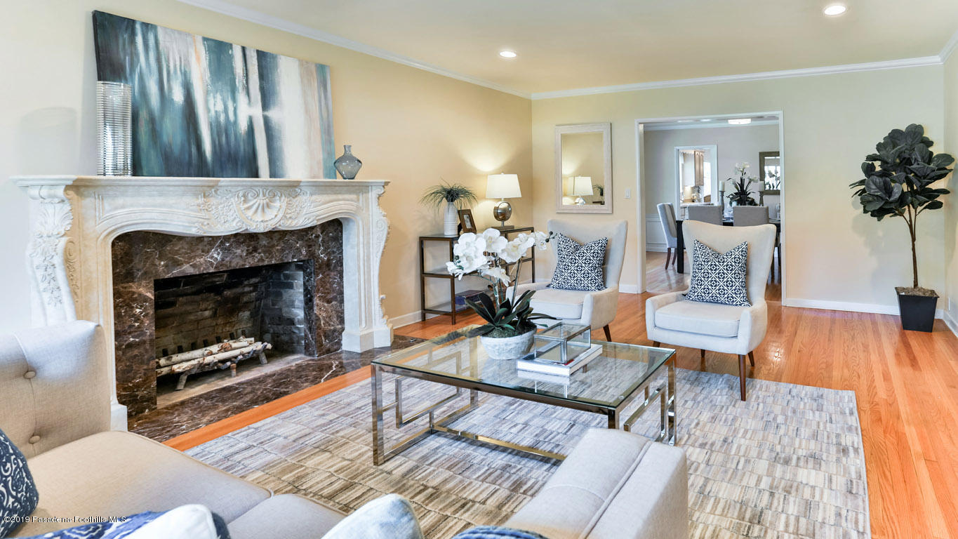 3810 Fairmeade Road Pasadena, CA 91107 - Photo 7 of 47 a living room with furniture and a fireplace