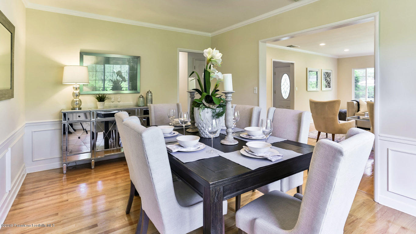 3810 Fairmeade Road Pasadena, CA 91107 - Photo 10 of 47 a view of a dining room with furniture and wooden floor