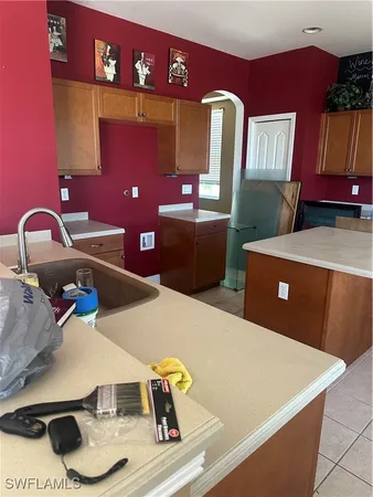 a room with furniture and air hockey table