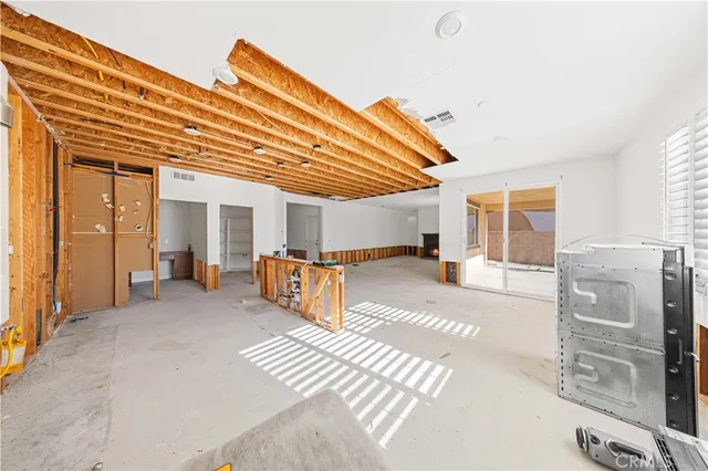 a view of a livingroom with furniture