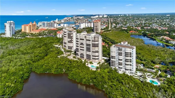 a view of a street with a building in the background