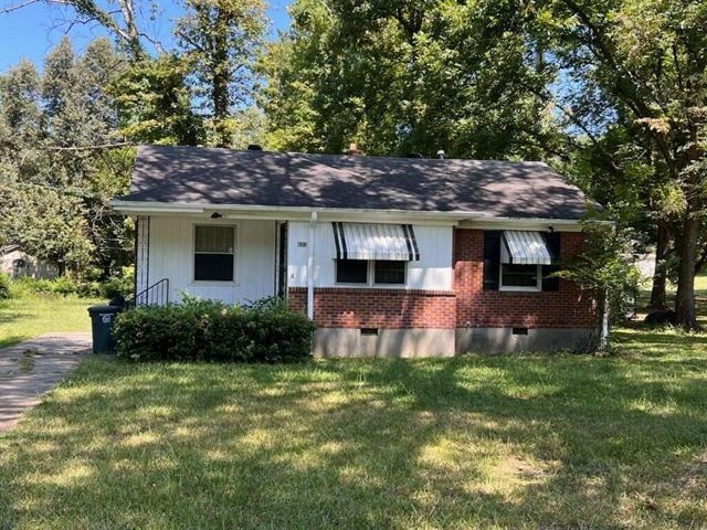 a house view with a garden space