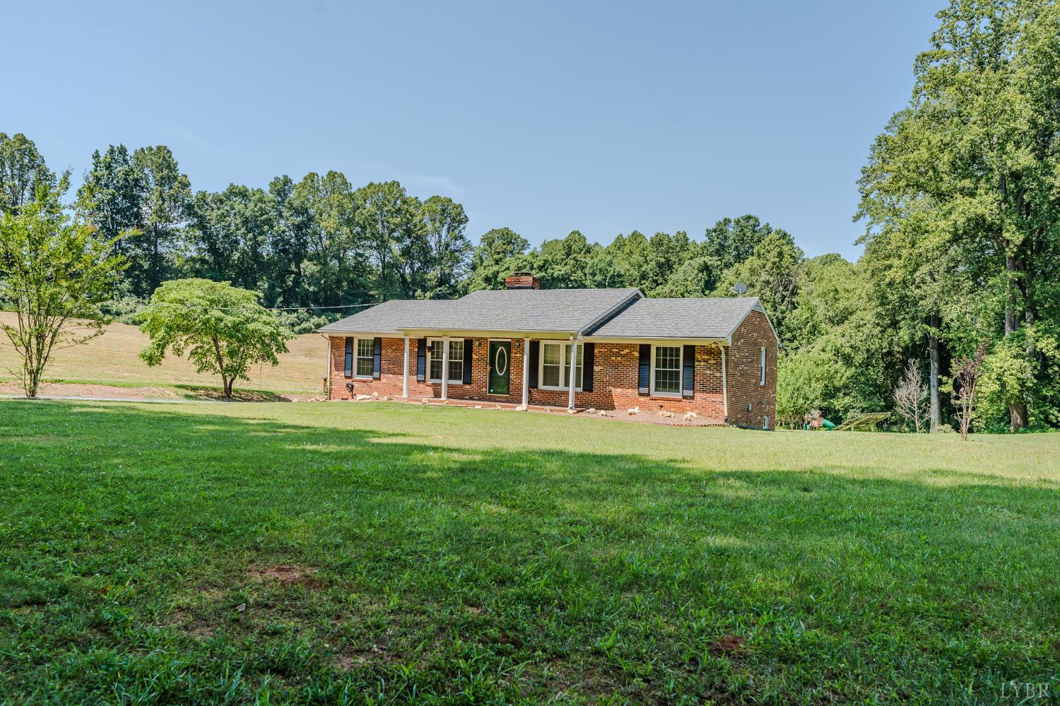 1553 Old Stage Road Amherst, VA 24521 - Photo 11 of 61 a front view of a house with a yard