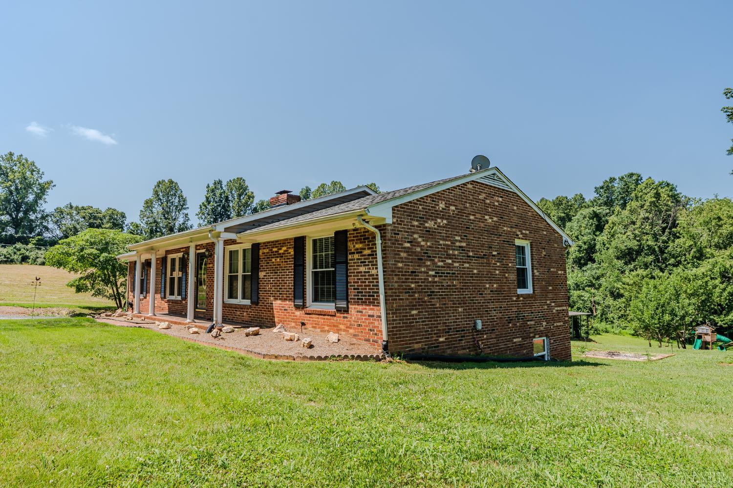 1553 Old Stage Road Amherst, VA 24521 - Photo 12 of 61 a view of a house with backyard porch and sitting area