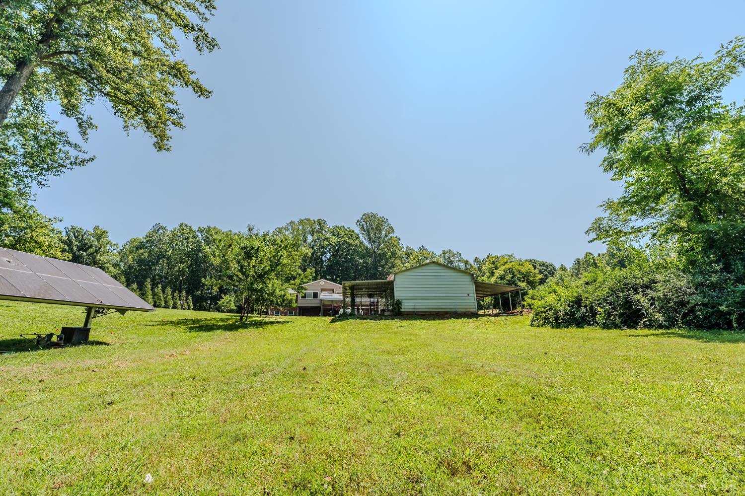 1553 Old Stage Road Amherst, VA 24521 - Photo 24 of 61 a view of a swimming pool with an outdoor space and seating area