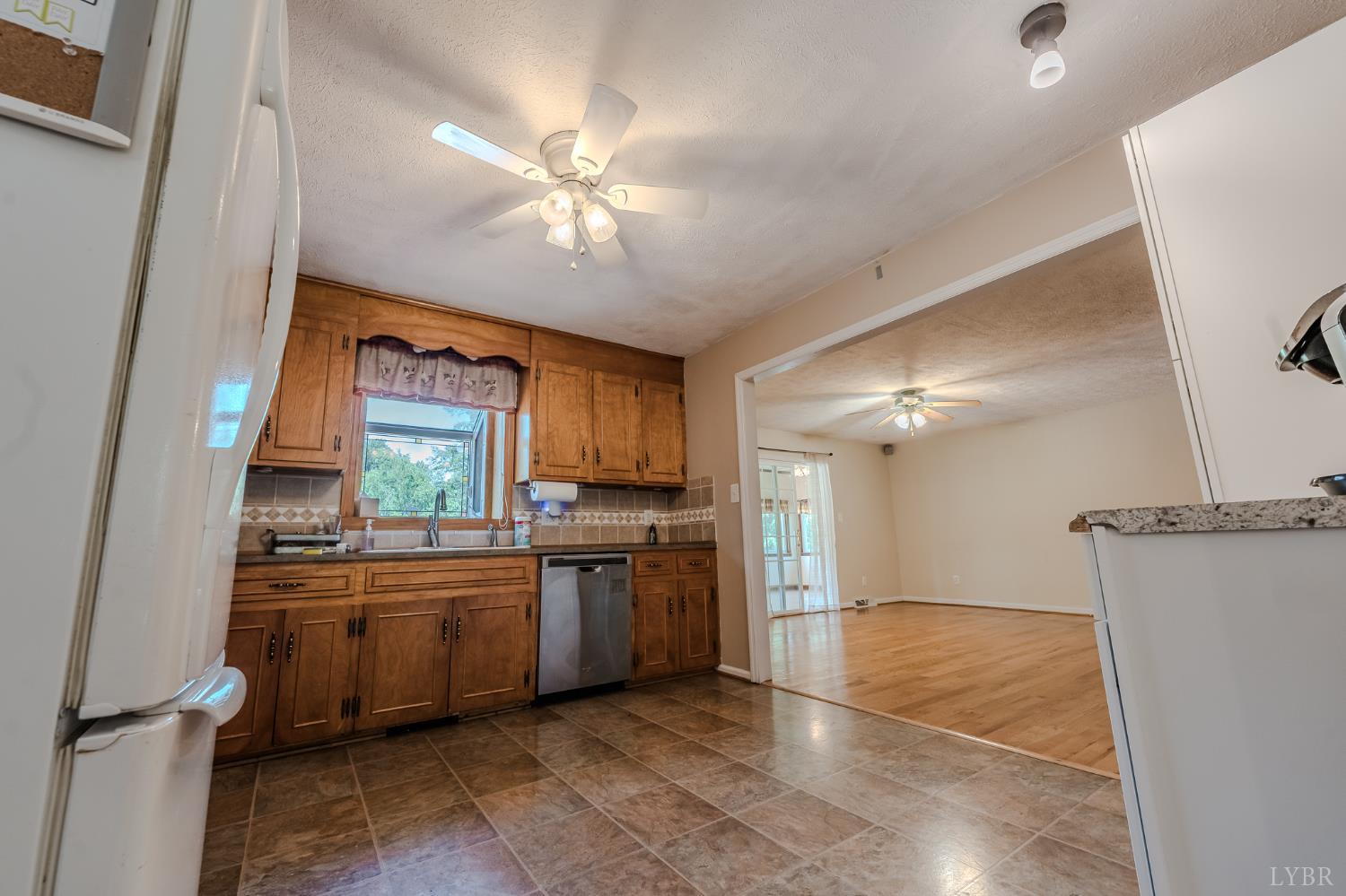 1553 Old Stage Road Amherst, VA 24521 - Photo 28 of 61 a large kitchen with kitchen island a sink stainless steel appliances and cabinets