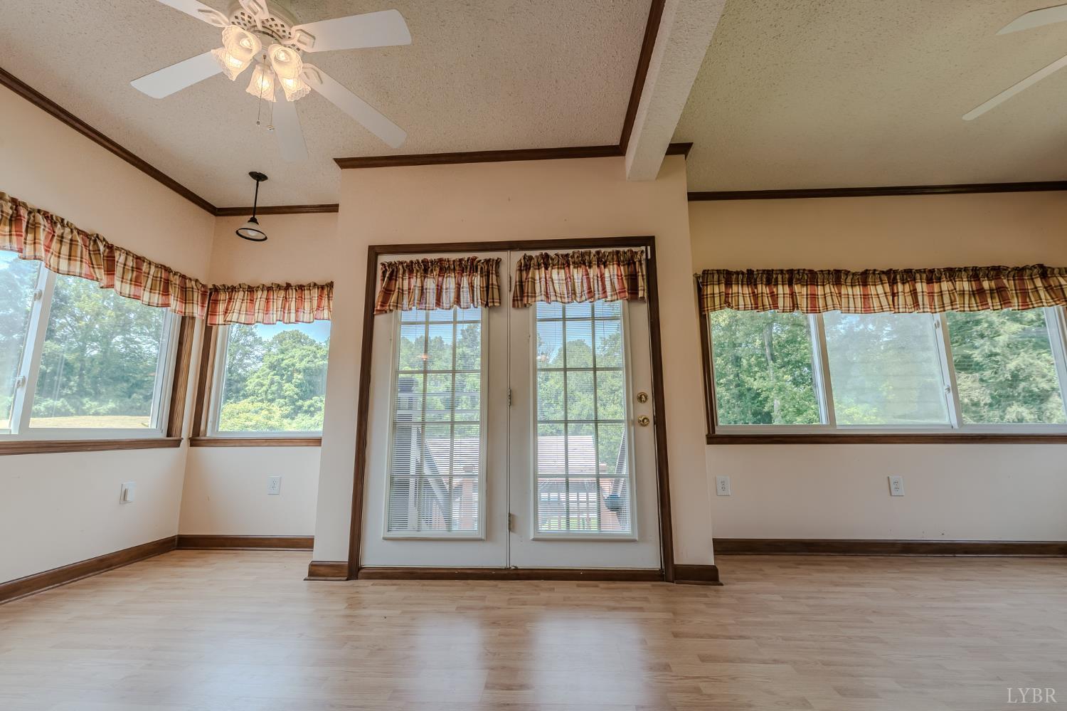 1553 Old Stage Road Amherst, VA 24521 - Photo 34 of 61 a view of an empty room with wooden floor and a window