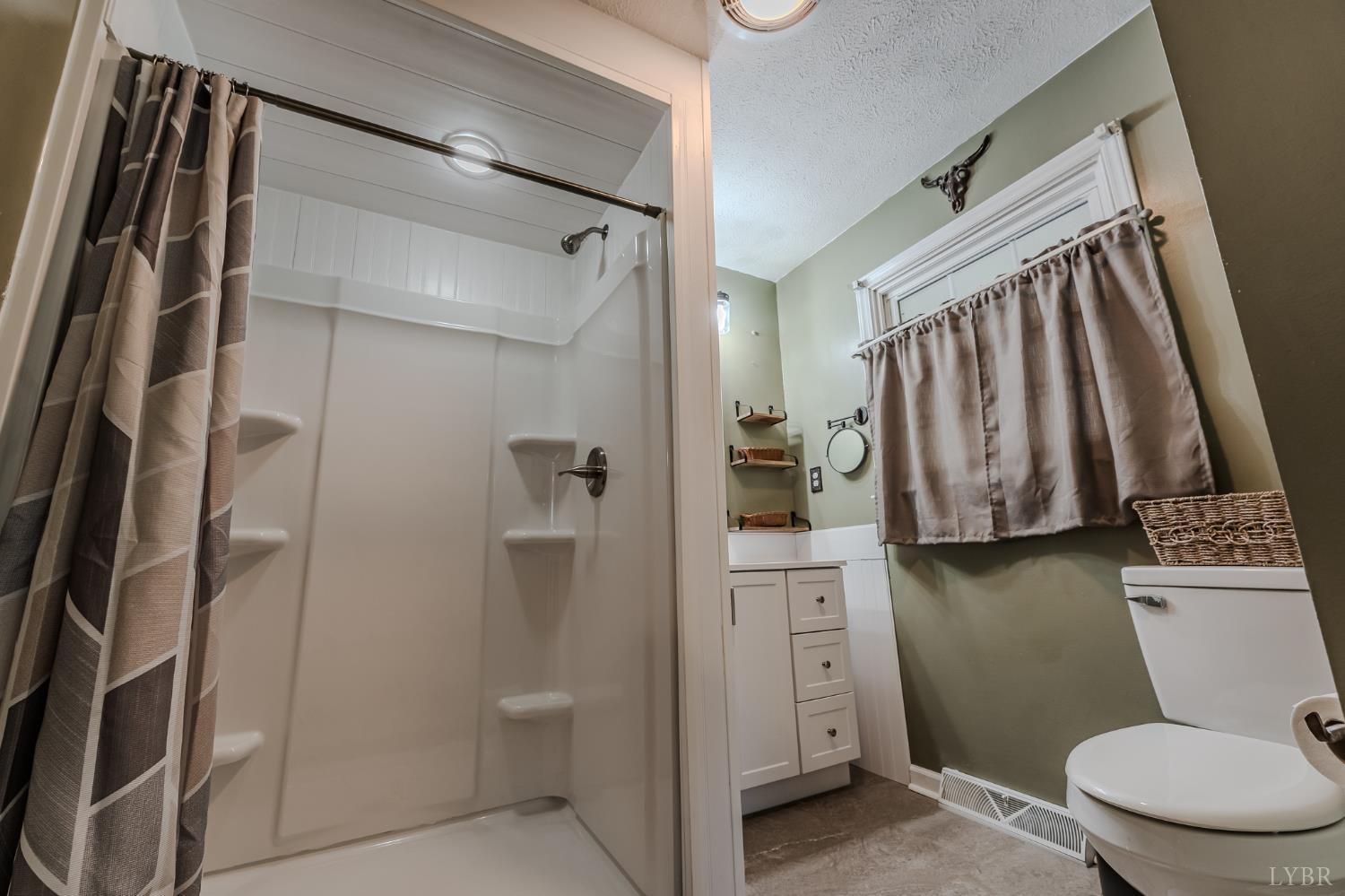 1553 Old Stage Road Amherst, VA 24521 - Photo 45 of 61 a bathroom with a toilet and a shower