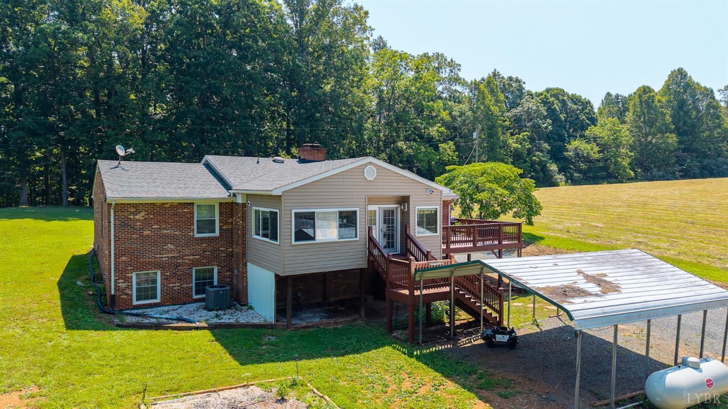 1553 Old Stage Road Amherst, VA 24521 - Photo 5 of 61 a view of a house with pool and chairs