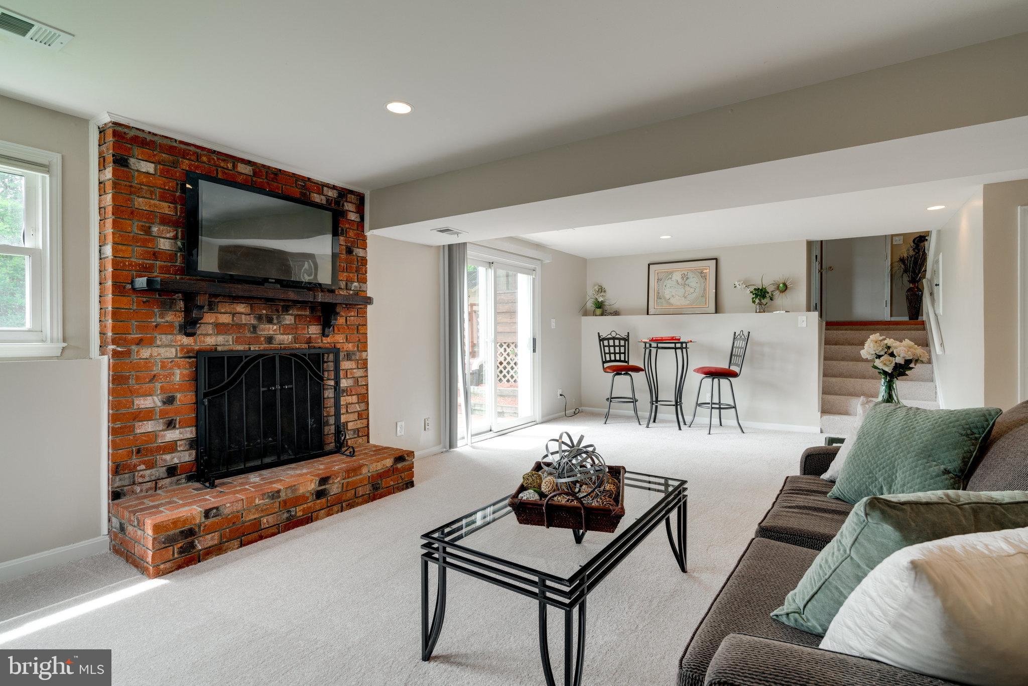6926 Spur Road Springfield, VA 22153 - Photo 43 of 75 Wood Burning Fireplace for Extra Ambience