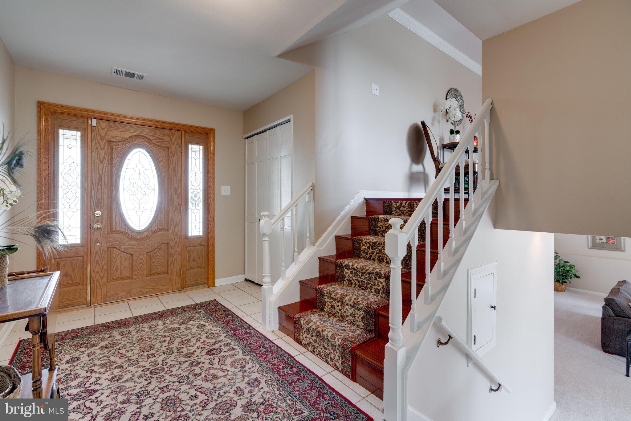 6926 Spur Road Springfield, VA 22153 - Photo 10 of 75 A short flight of stairs up or down for each level