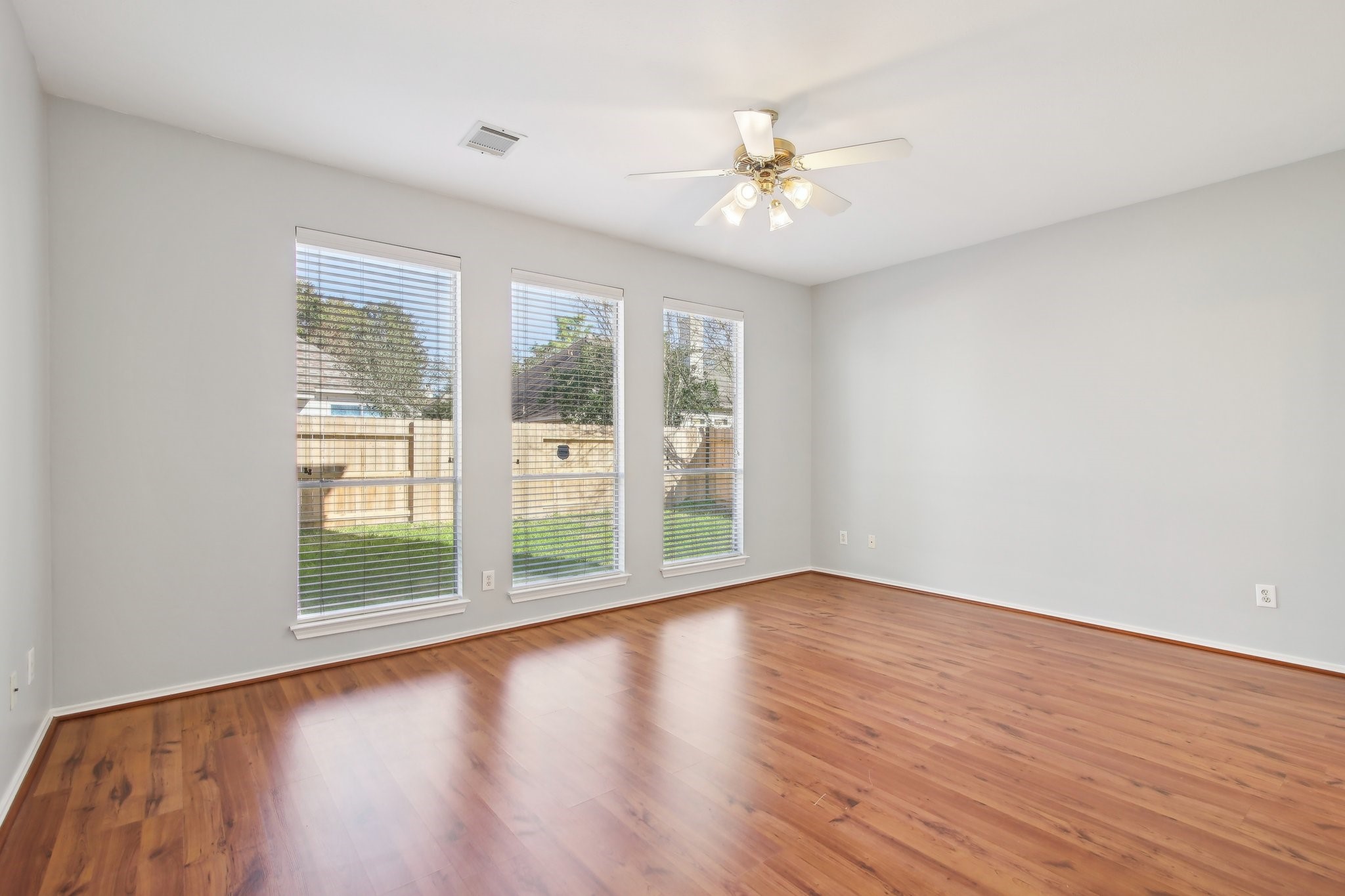 16210 Broken Timber Circle Houston, TX 77095 - Photo 14 of 28 Primary bedroom with a view of the backyard.