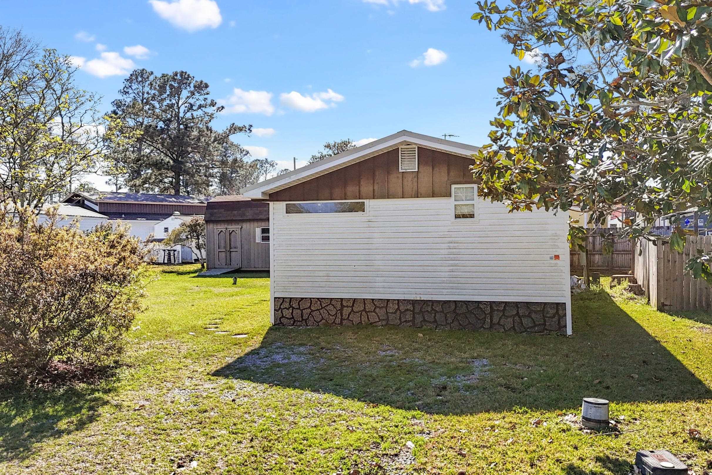 681 Escambia Loop Lillian, AL 36549 - Photo 19 of 34 Side Of Structure