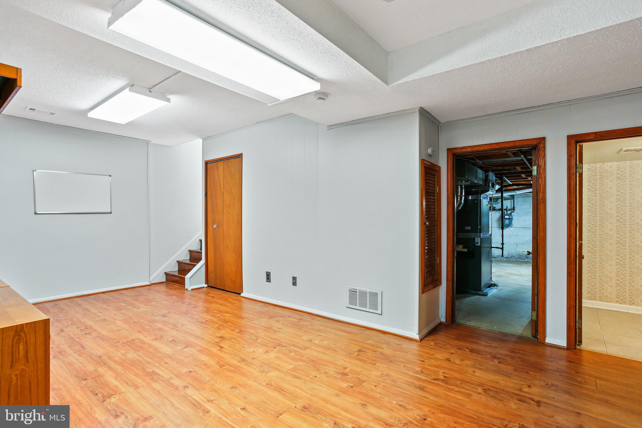 8216 Scotts Level Road Pikesville, MD 21208 - Photo 30 of 42 Large Lower Level Rec Room