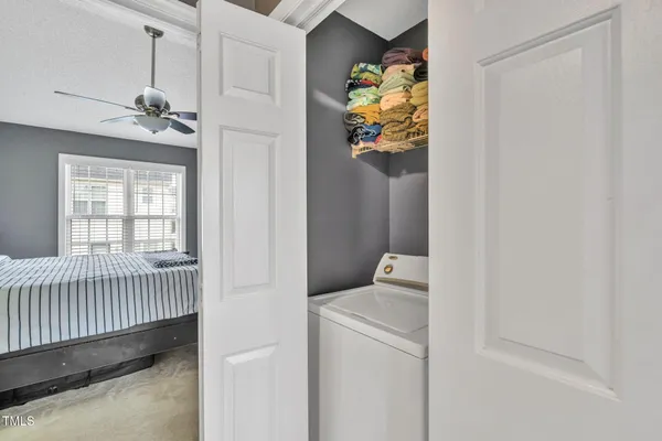 a view of a bedroom from a hallway