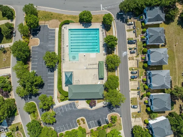 an aerial view of a house with outdoor space
