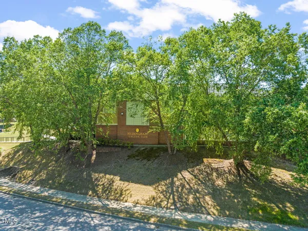 a view of lake with green space