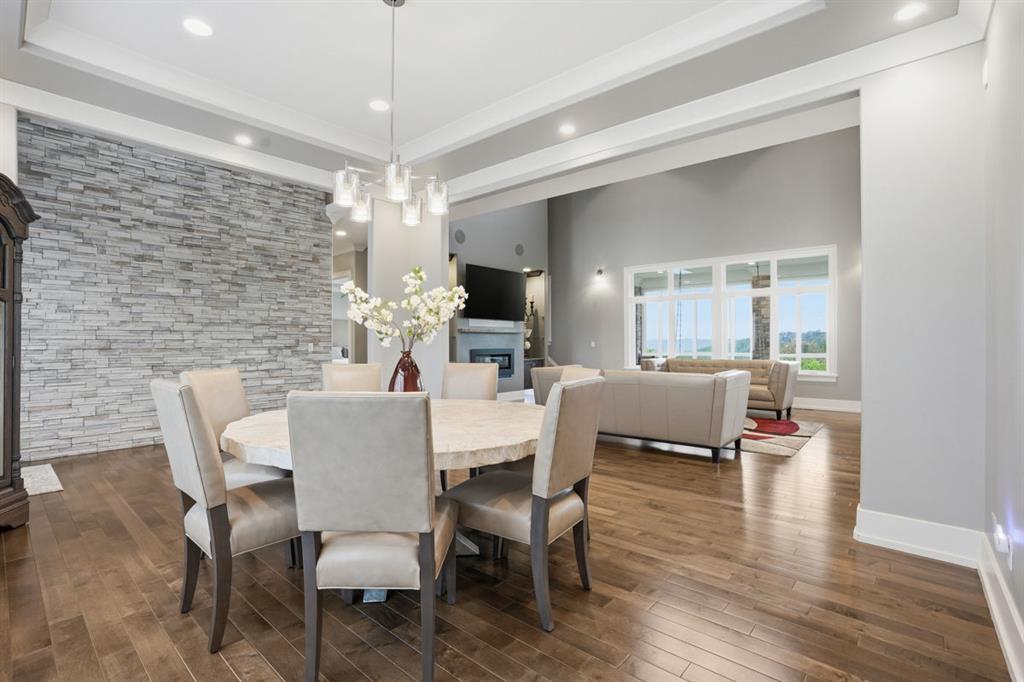 931 Pleasant Hill Road Wexford, PA 15090 - Photo 19 of 50 a view of a dining room with furniture window and wooden floor