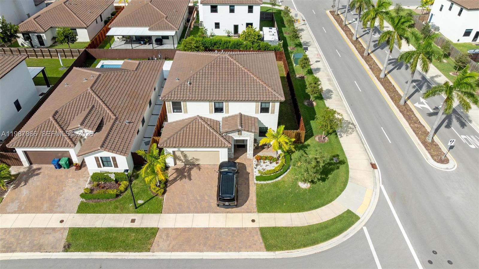 11903 Southwest 241st Street, Unit 11903 Homestead, FL 33032 - Photo 51 of 57 an aerial view of a house