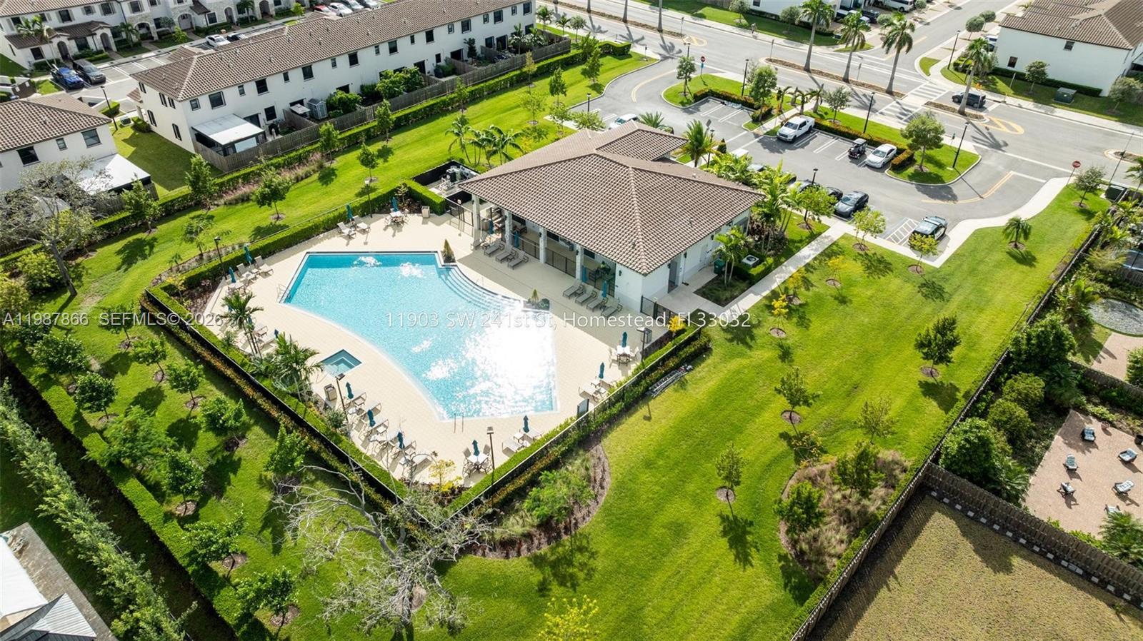 11903 Southwest 241st Street, Unit 11903 Homestead, FL 33032 - Photo 56 of 57 an aerial view of swimming pool