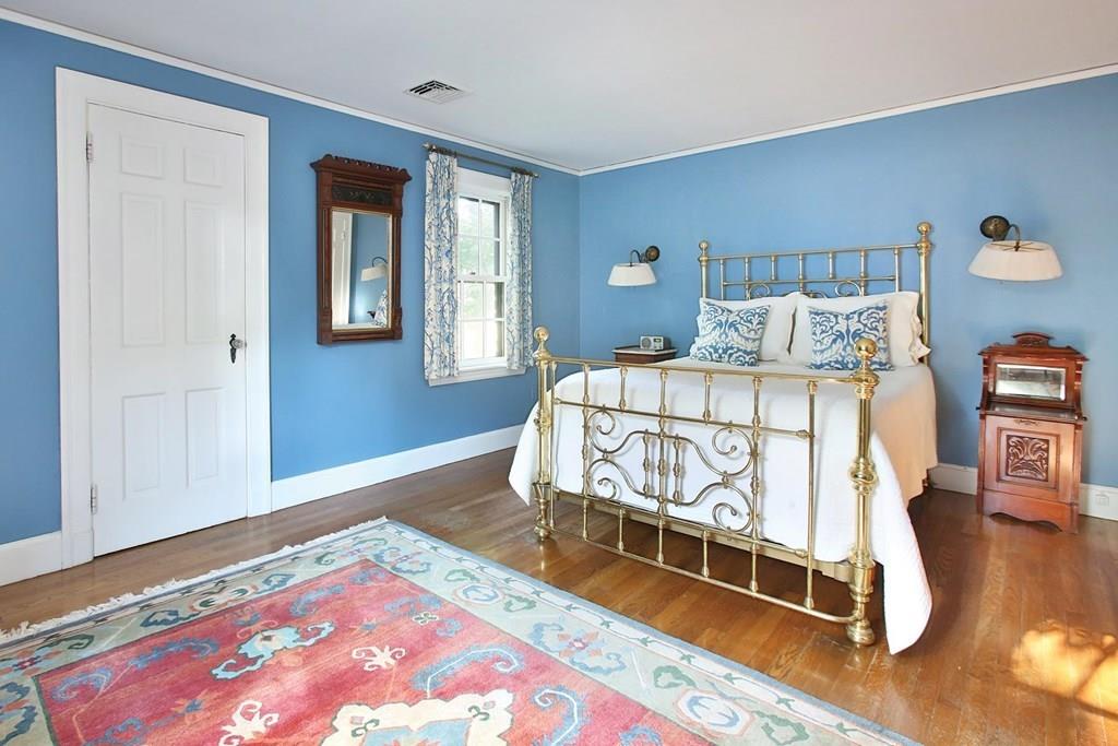 134 Woodcliff Road Newton, MA 02461 - Photo 6 of 9 a bedroom with a bed and a window