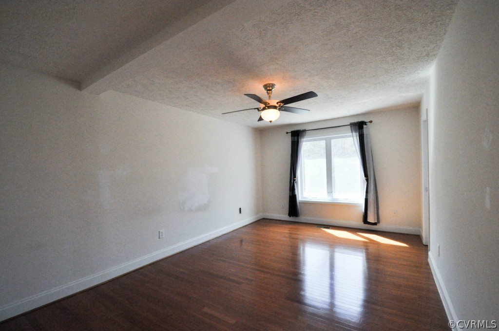 20348 Ben Gayle Road Beaverdam, VA 23015 - Photo 11 of 24 a view of empty room with wooden floor and fan