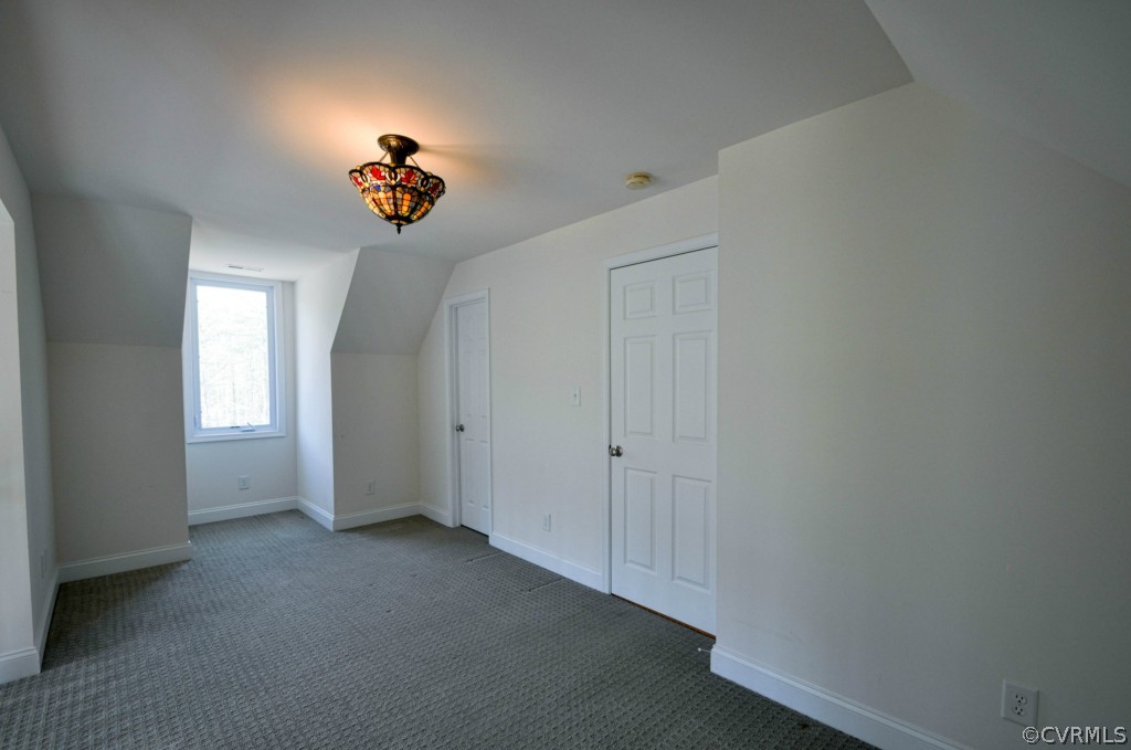 20348 Ben Gayle Road Beaverdam, VA 23015 - Photo 18 of 24 a view of a livingroom with a chandelier fan