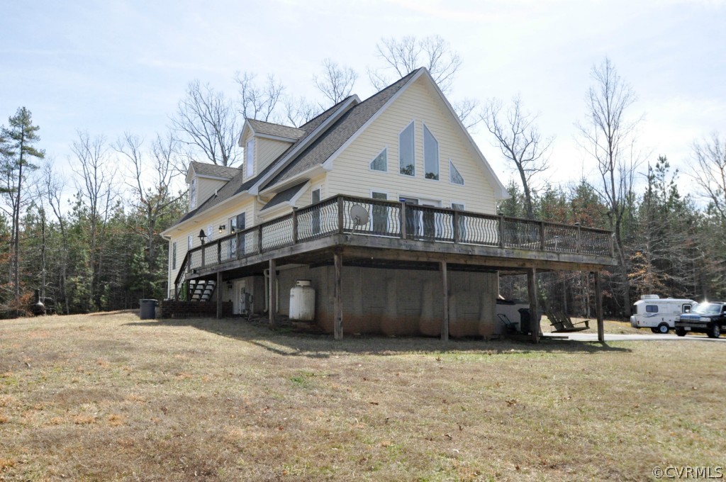20348 Ben Gayle Road Beaverdam, VA 23015 - Photo 22 of 24 a view of a house with a yard