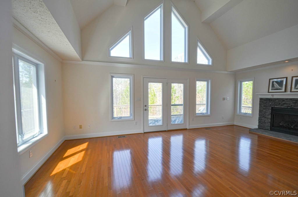 20348 Ben Gayle Road Beaverdam, VA 23015 - Photo 3 of 24 a view of an empty room with wooden floor and a window