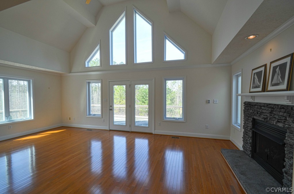 20348 Ben Gayle Road Beaverdam, VA 23015 - Photo 4 of 24 a view of an empty room with wooden floor and a window