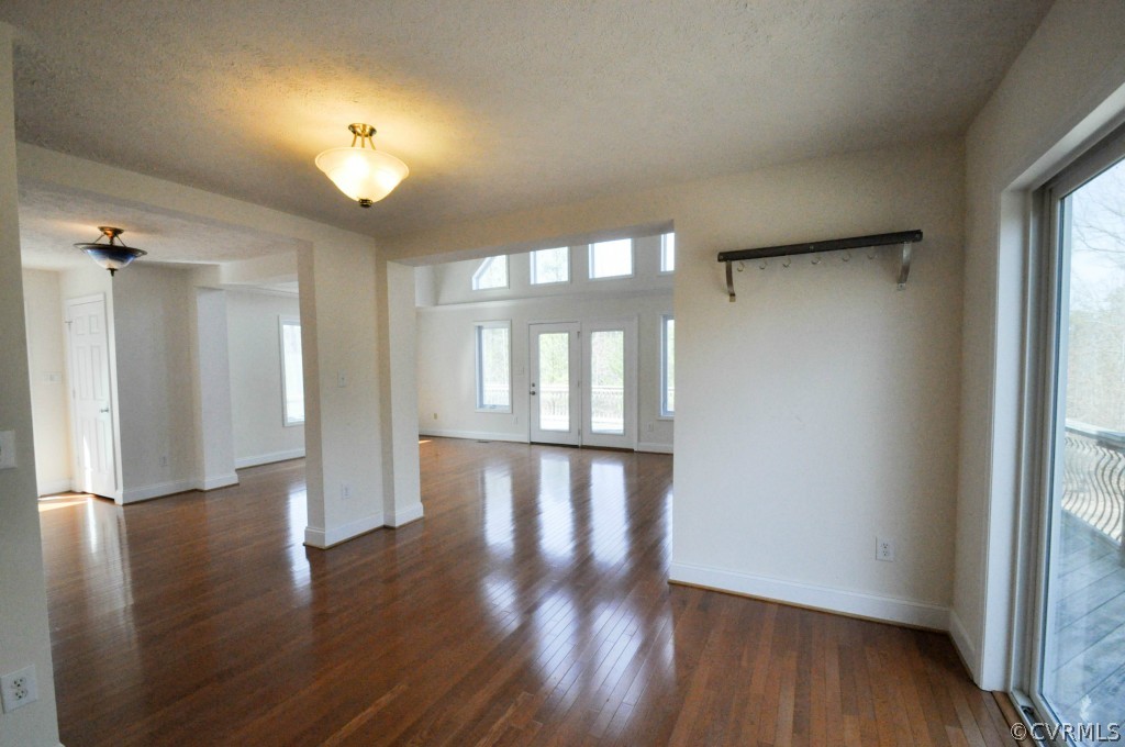20348 Ben Gayle Road Beaverdam, VA 23015 - Photo 9 of 24 a view of empty room with wooden floor and fan