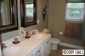 3208 Lentel Road Midland, NC 28107 - Photo 8 of 8 a bathroom with a sink toilet and mirror