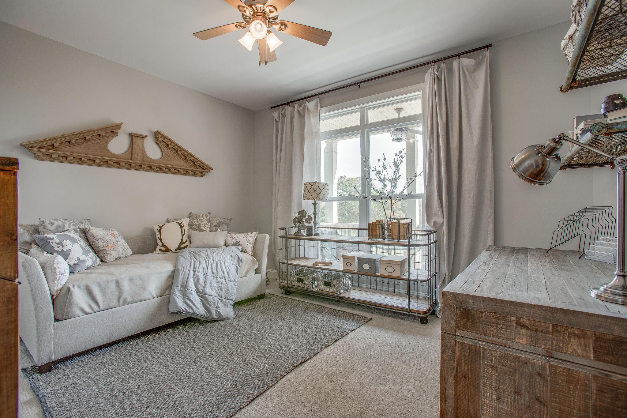 7901 Pinewood Road Fairview, TN 37062 - Photo 18 of 29 a living room with furniture and a window