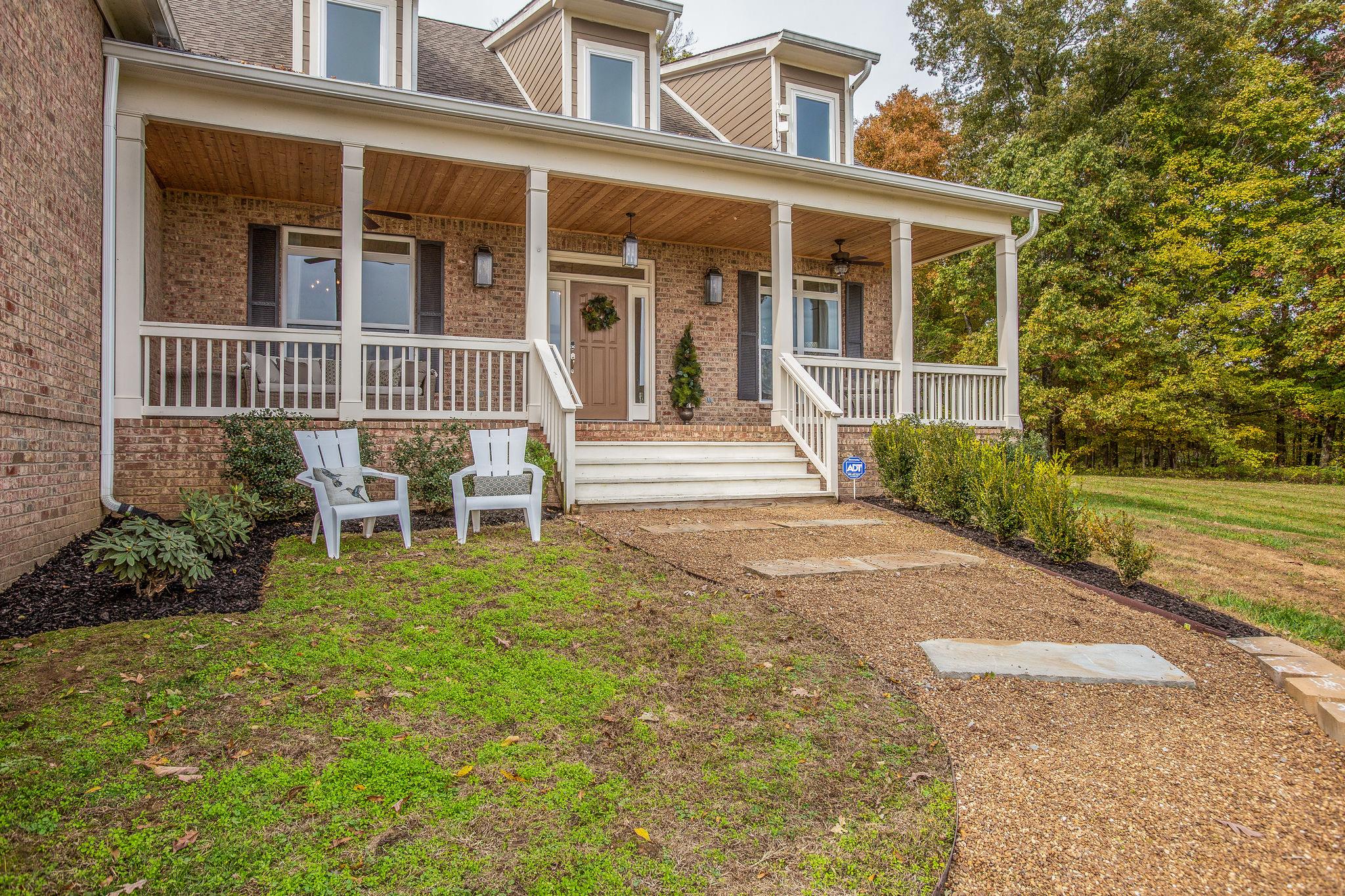 7901 Pinewood Road Fairview, TN 37062 - Photo 3 of 29 front view of a house with a yard