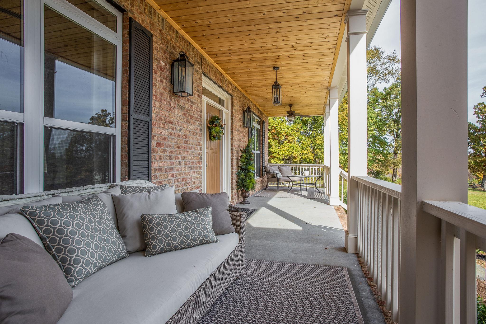 7901 Pinewood Road Fairview, TN 37062 - Photo 4 of 29 a living room with furniture and a large window