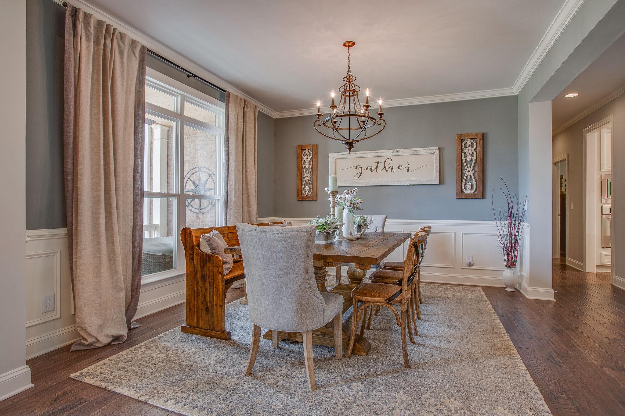 7901 Pinewood Road Fairview, TN 37062 - Photo 7 of 29 a view of a dining room with furniture window and wooden floor