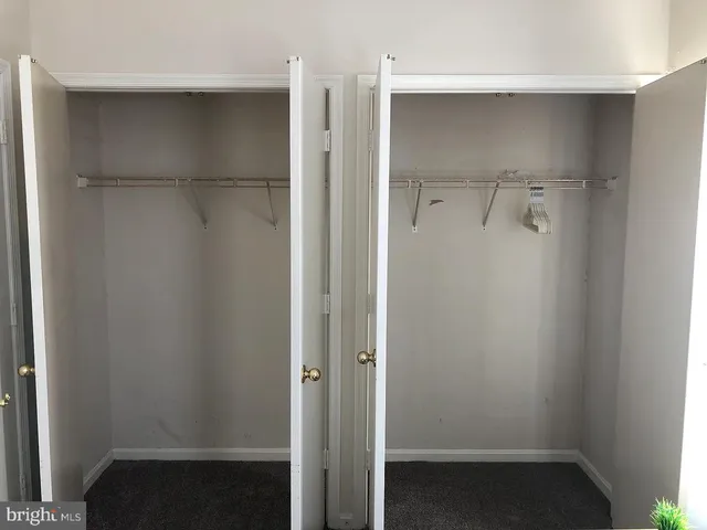 a view of a storage & utility room with washing machine