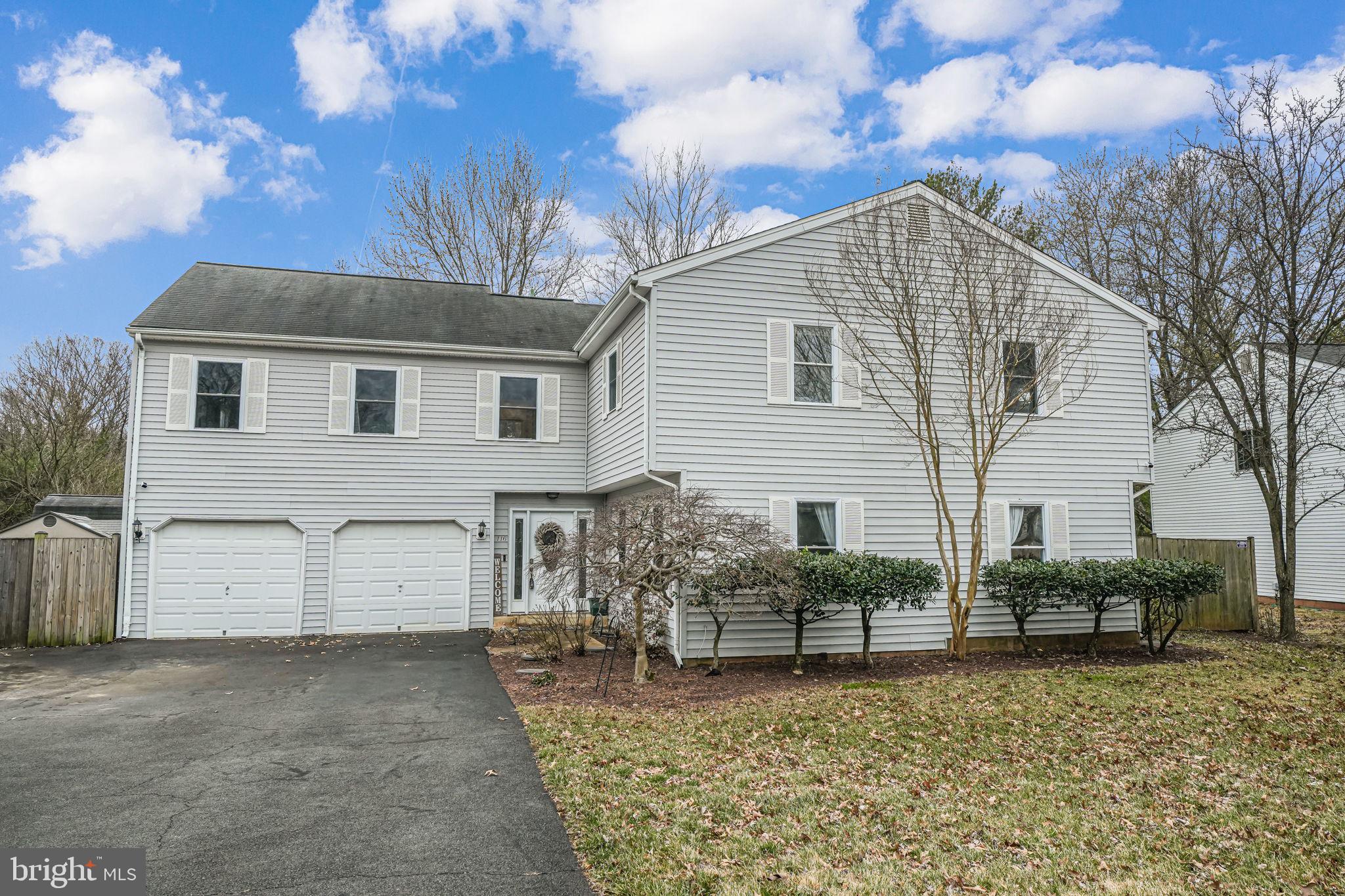 116 Elm Tree Lane Sterling, VA 20164 - Photo 2 of 56 a view of a house with a yard