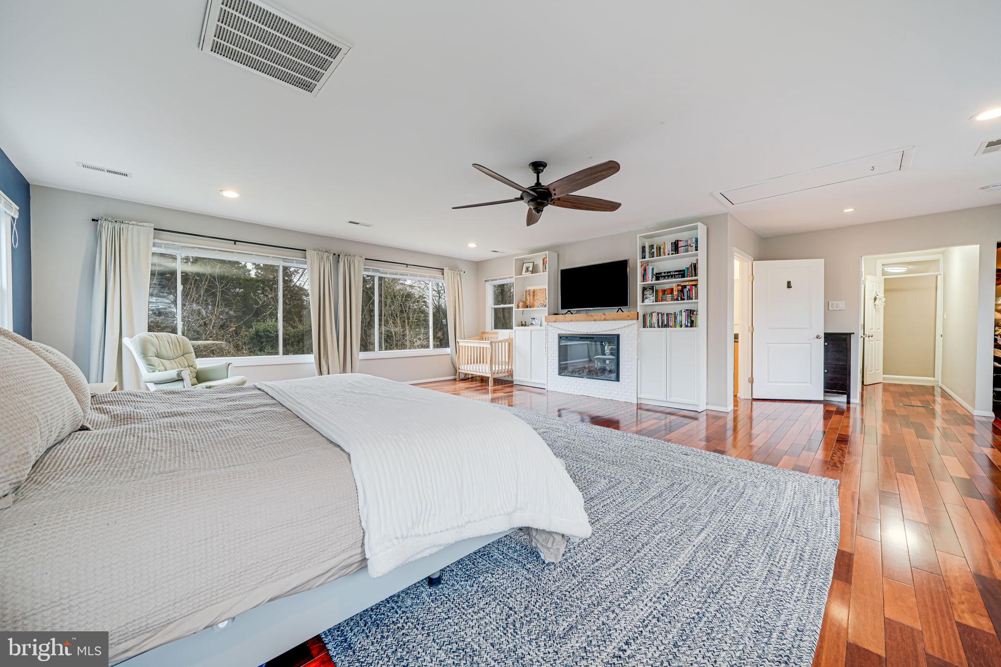 116 Elm Tree Lane Sterling, VA 20164 - Photo 31 of 56 a bed room with a bed and a television