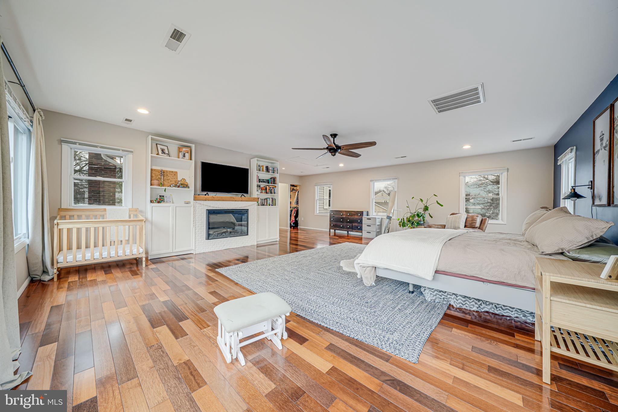 116 Elm Tree Lane Sterling, VA 20164 - Photo 32 of 56 a living room with furniture and a flat screen tv