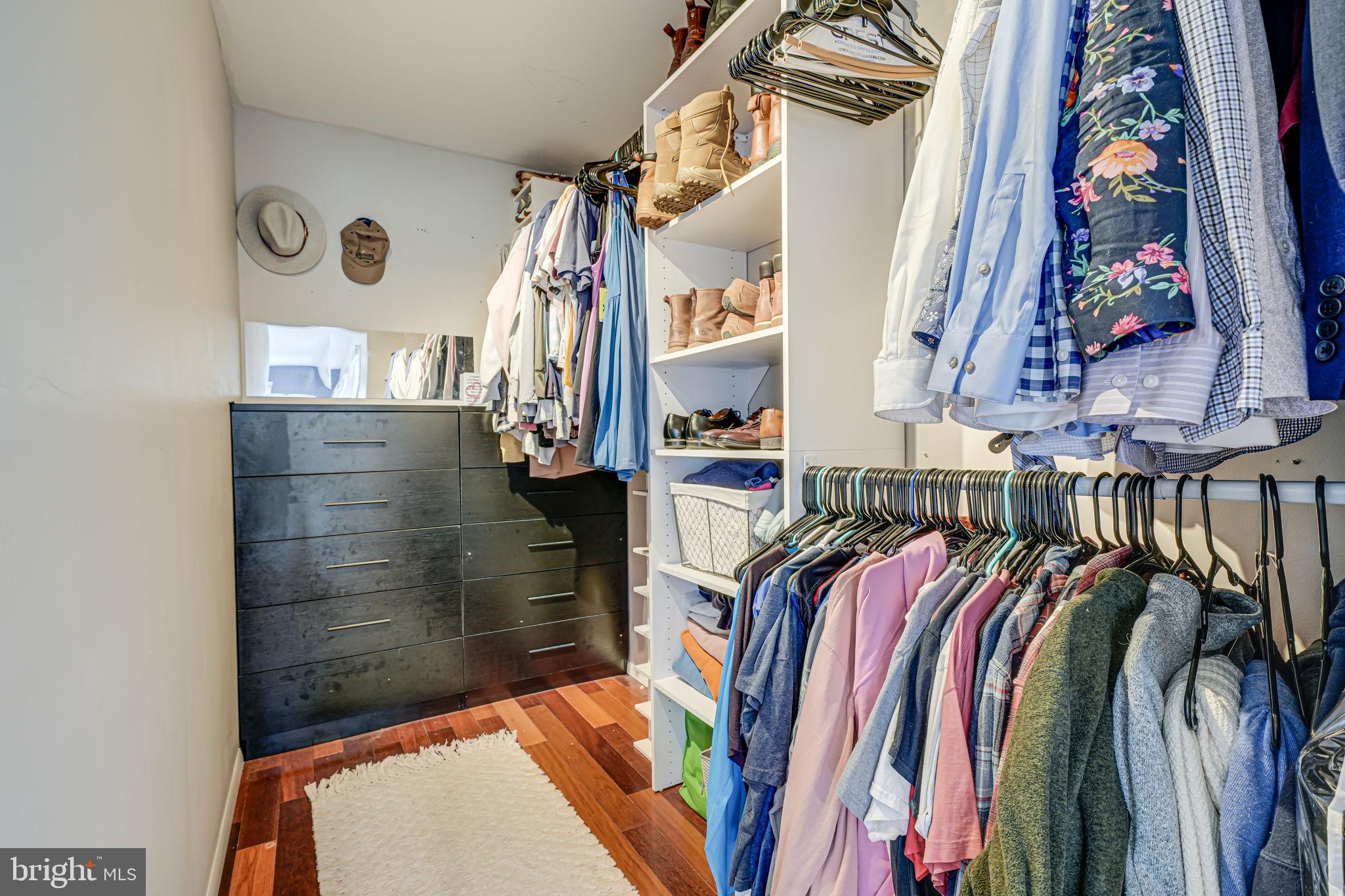 116 Elm Tree Lane Sterling, VA 20164 - Photo 36 of 56 a view of walk in closet with clothes and shoes