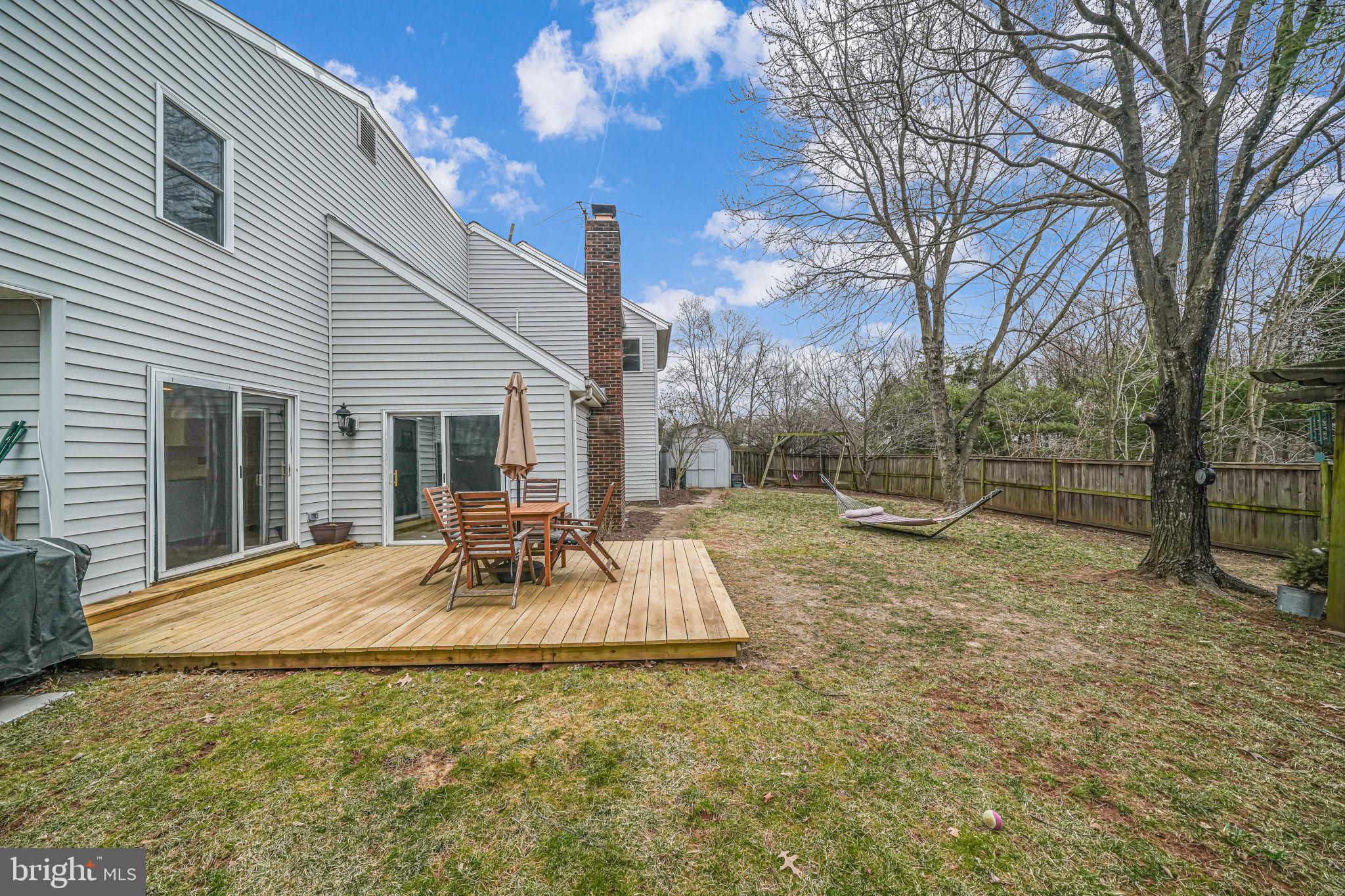 116 Elm Tree Lane Sterling, VA 20164 - Photo 47 of 56 a view of a house with backyard