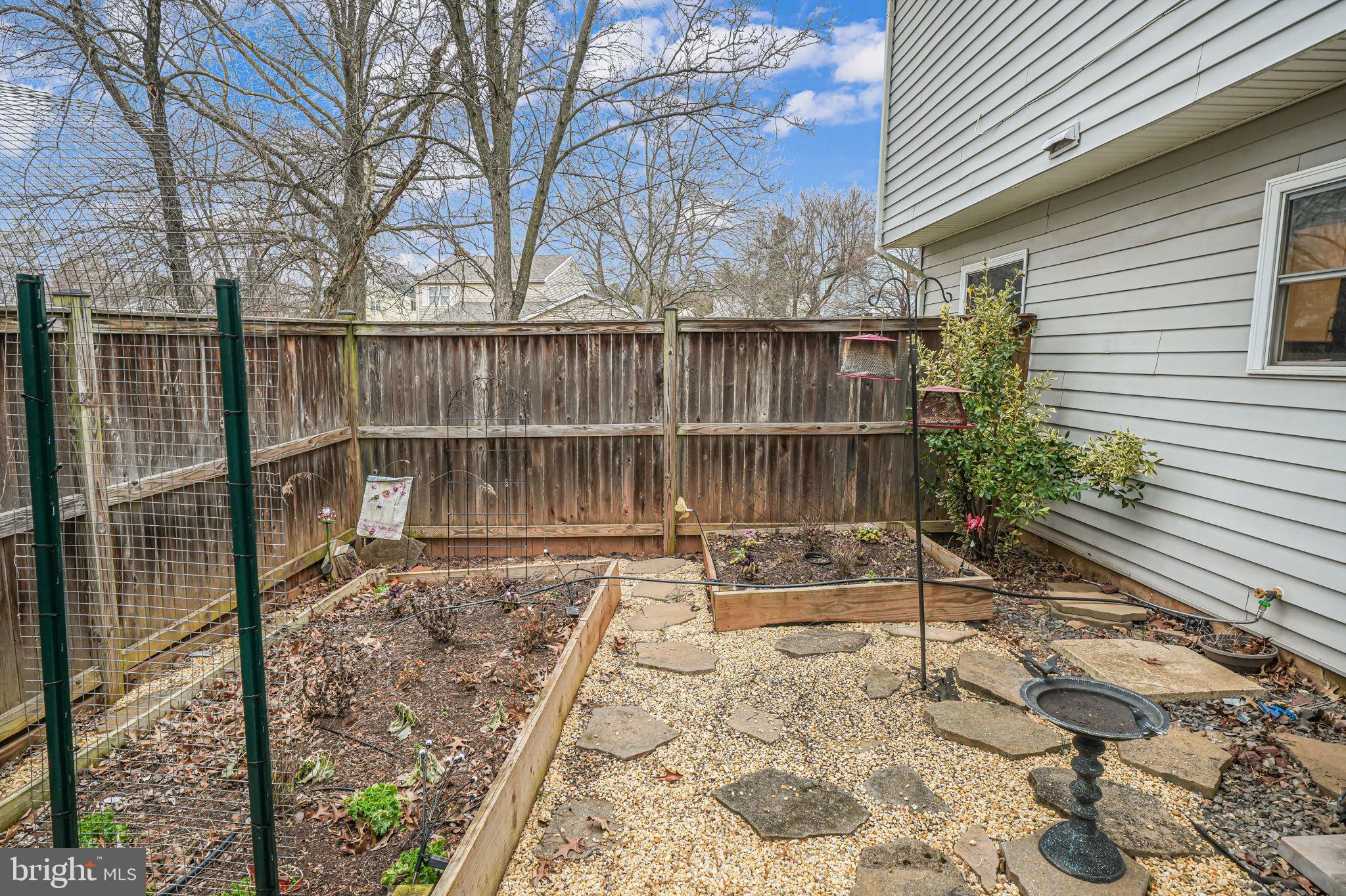 116 Elm Tree Lane Sterling, VA 20164 - Photo 49 of 56 a backyard of a house with seating space
