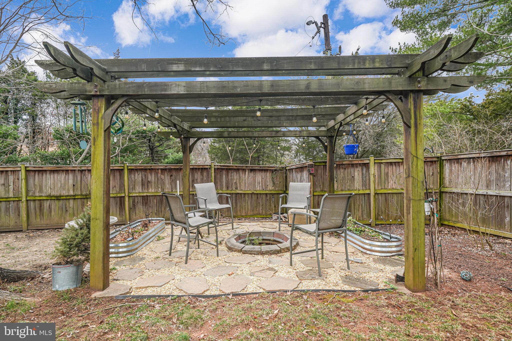 116 Elm Tree Lane Sterling, VA 20164 - Photo 50 of 56 a view of a chairs and table in patio